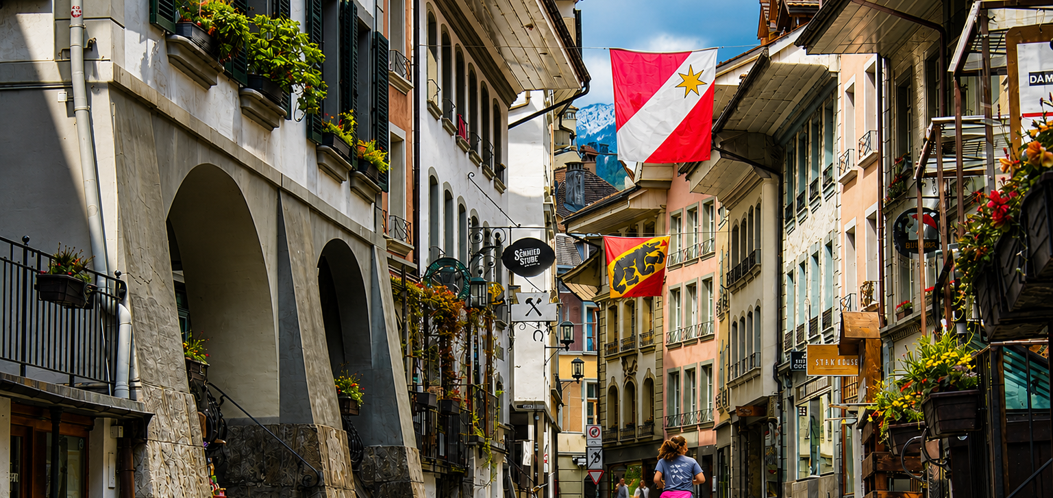 A photo of the centre of Thun featuring a woman jogging around.